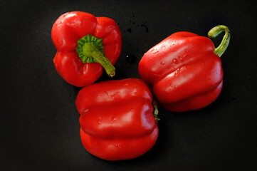 SWEET RED PEPPER ON A DARK BACKGROUND