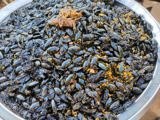 Fried water bugs in the street market of Siem Reap
