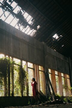 girl at Taman Festival Padang Galak in Bali, Indonesia, Abandoned building