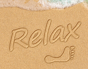 Word Relax on beach - vacation concept background