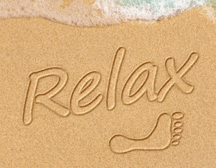 Word Relax on beach - vacation concept background