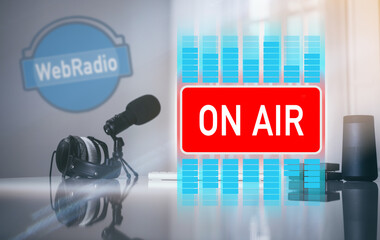 Desk with microphone, headphones and computer. Web radio, communication entertainment on air concept