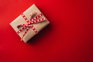 gift box on valentines day on red background.