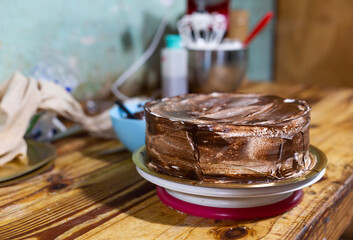 Making of chocolate cake. Small baking business.