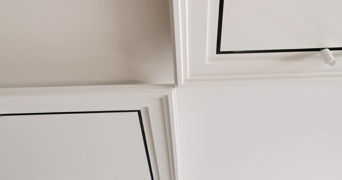 Minimalist suspended ceiling and plasterboard construction in decorating the apartment or house with modern white lamps. video with dolly. Modern Ceiling with Lamp. Minimalist Interior