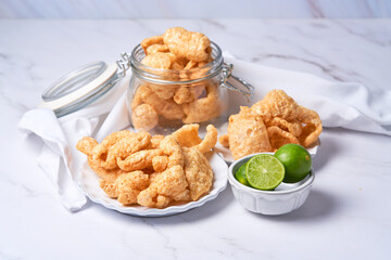 Pork rinds also known as chicharon or chicharrones, deep fried pork skin