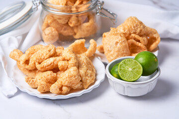 Chicharron - deep fried pork rinds, crispy pork skin pieces, traditional mexican snack