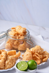 Pork rinds also known as chicharon or chicharrones, deep fried pork skin