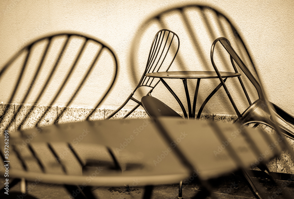 Sticker chairs at a sidewalk cafe