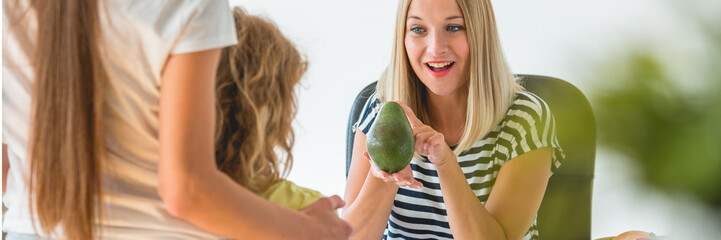 Worried mother and little boy during a visit to a dietitian prep