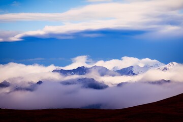 Fototapeta na wymiar Mountains in the clouds