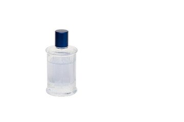 Glass transparent bottle with a blue cap for toilet water, perfume, cologne close-up isolated on a white background