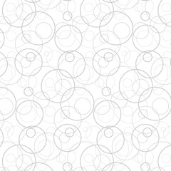 Seamless vector pattern of intersecting circles of different sizes. Minimalist background