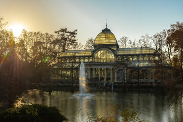 Fototapeta premium Madrid, Spain 28-12-2022 the Glass Palace located in El Retiro Park, a UNESCO World Heritage Site. It was originally built in 1887 as a greenhouse to showcase flora and fauna as part of an exhibition