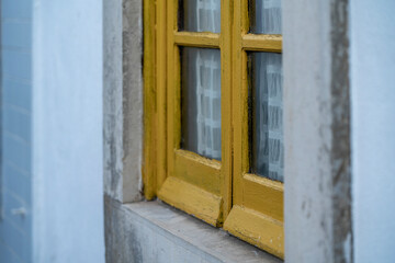 Yellow window frame detail old wood 