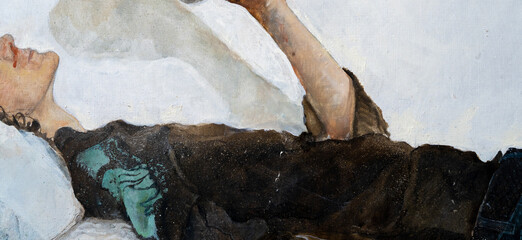 A young man with curly hair holds a handkerchief in his hand. The young man lies on a pillow. Classical melancholy painting with biblical motifs. Clock on a white wall.