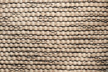 A rug handmade with black and white fabric