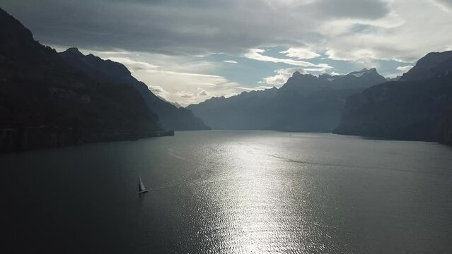 Sailboat on a huge lake in Switzerland Fall Time