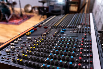 Fototapeta na wymiar Mixing console for mixing audio signals. Professional musical instrument for recording studio