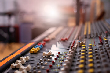 Fototapeta Mixing console for mixing audio signals. Professional musical instrument for recording studio obraz