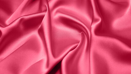 Viva Magenta toned red magenta fabric atlas. Close up pink silk satin texture for sewing. Abstract background wallpaper. Twisted folds cloth. Trendy color of the year 2023. Fashion color pattern

