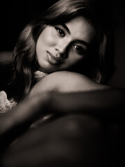 Beautiful Asian model posing in studio in traditional Chinese Cheongsam for Chinese New Year