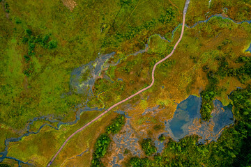 Aerial landscape Altai melancholic mood, blue geyser lake, mountains Altay Russia drone view