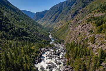 Fototapeta na wymiar Aerial view waterfall Uchar. Summer landscape travel of Altai mountains Russia