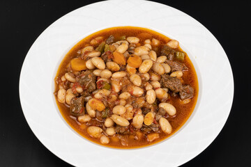 Kuru Fasulye. Traditional Turkish cuisine. Turkish dish. Haricot beans with meat. Top view