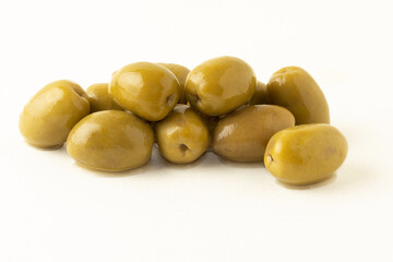 Green olives isolated on white background.