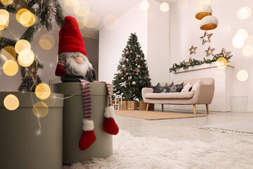 Obraz premium Living room interior with Christmas tree and festive decor
