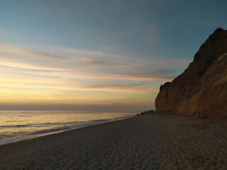 sky sea sunset perfect sky calm sand beach horizon path road yellow rocks