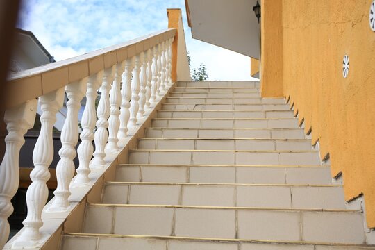 Beige House Stairs Outdoors On Sunny Day, Low Angle View