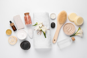 Obraz na płótnie Canvas Flat lay composition with different spa products on white background
