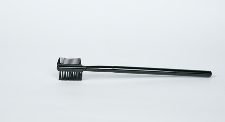 Eyebrow brush. Elite level cosmetics. A series of shots