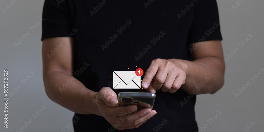 Poster email marketing and online communication concept. businessman using smartphone for checking email on