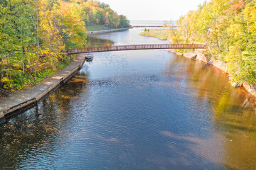 Fototapeta na wymiar bridge over the river in Autumn