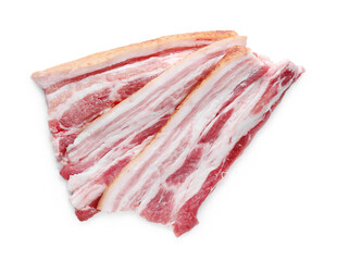Slices of tasty pork fatback with spices on white background, top view