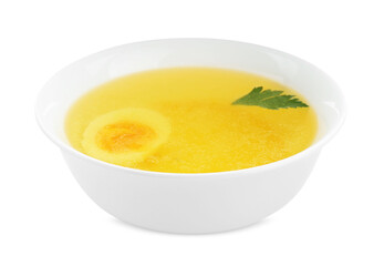 Delicious bouillon with egg and parsley in bowl on white background