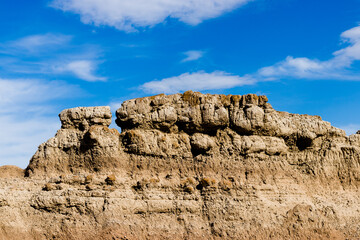 Dry Landscape of badlands National Park Along the Blue Sky