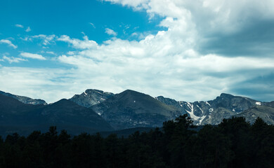 Snow Covered Rocky Mountains in the Distance