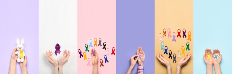 Female hands and many different awareness ribbons on color background. World Cancer Day