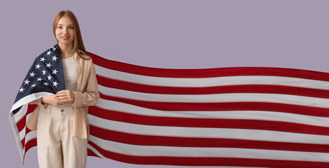 Young redhead woman with USA flag on lilac background