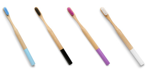Set of bamboo toothbrushes isolated on white, top view