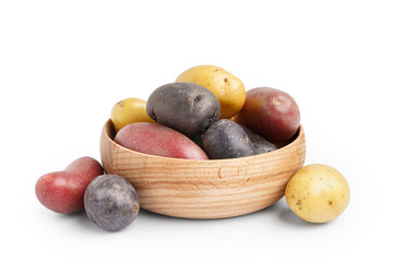 Wooden bowl of raw potatoes on white background