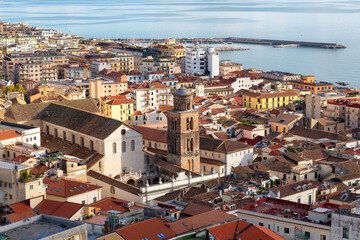 Touristic City by the Sea. Salerno, Italy. Aerial View. Cityscape and mountains background