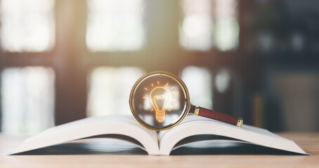 for Concept new idea, concept with innovation and inspiration, innovative technology in science concept and modern business development,creative idea,a light bulb is placed on a book