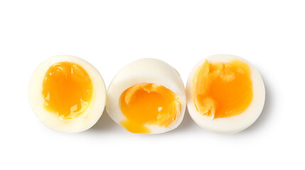 Sliced soft boiled eggs on white background