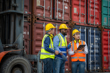 Engineer working and checking a quality of containers box from cargo ship for export and import,Container Shipping Logistics Engineering concept.