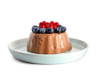 Delicious chocolate pudding with fresh berries on plate isolated on white background
